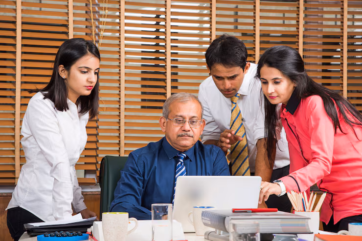 asian-indian-business-people-corporate-culture-working-office-concept-with-laptop-papers-meetings-presentations-discussions_466689-15273